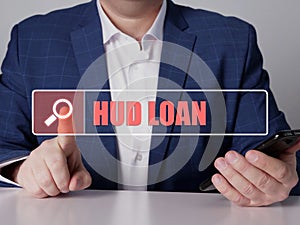 Search HUD LOAN Housing and Urban DevelopmentÂ  button. Modern Loan officer use cell technologies
